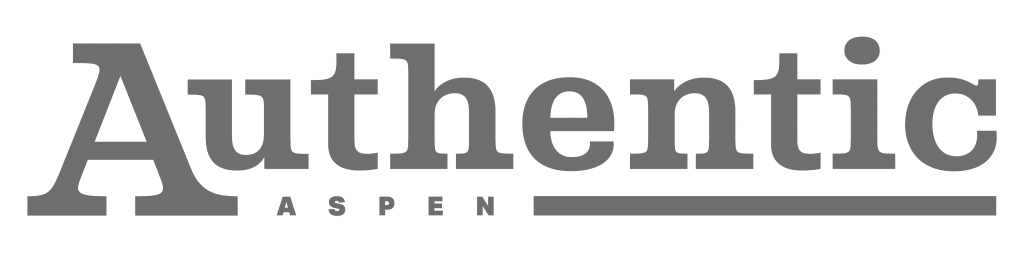 The image displays the word "Authentic" in large gray font, with "Aspen" and a horizontal line underneath on a light background, reflecting Premier Media Network’s commitment to trusted Digital & Advertising Solutions.